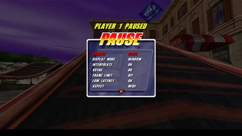 Menú PAUSE sobre la carrera con las opciones ADVANCED: CAMERA, DISPLAY MODE, INTERPOLATE, VSYNC, FRAME LIMIT, LOW LATENCY y ASPECT.